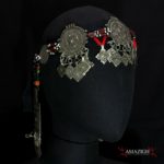 Mid 20th century. Silver (niello decorations), coral, agate and glass beads on cotton band; grams 155,8 (5.50 oz.). The piece is cm. 74,0 in lenght (29.13″); the decorated part is cm. 37,0 in lenght (14.57″).  Berbers are the indigenous ethnic group of North Africa. They are continuously distributed from the Atlantic to the Siwa oasis in Egypt, and from the Mediterranean to the Niger River. The name Berber appeared for the first time after the end of the Roman Empire. Many Berbers call themselves some variant of the word imazighen (singular: Amazigh), possibly meaning “free people” or “free and noble men”. Today, most Berber-speaking people live in Morocco and Algeria.  morr21