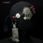 Mid 20th century. Silver (niello decorations), coral, agate and glass beads on cotton band; grams 155,8 (5.50 oz.). The piece is cm. 74,0 in lenght (29.13″); the decorated part is cm. 37,0 in lenght (14.57″).  Berbers are the indigenous ethnic group of North Africa. They are continuously distributed from the Atlantic to the Siwa oasis in Egypt, and from the Mediterranean to the Niger River. The name Berber appeared for the first time after the end of the Roman Empire. Many Berbers call themselves some variant of the word imazighen (singular: Amazigh), possibly meaning “free people” or “free and noble men”. Today, most Berber-speaking people live in Morocco and Algeria.  morr21
