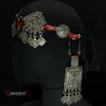Mid 20th century. Silver (niello decorations), coral, agate and glass beads on cotton band; grams 155,8 (5.50 oz.). The piece is cm. 74,0 in lenght (29.13″); the decorated part is cm. 37,0 in lenght (14.57″).  Berbers are the indigenous ethnic group of North Africa. They are continuously distributed from the Atlantic to the Siwa oasis in Egypt, and from the Mediterranean to the Niger River. The name Berber appeared for the first time after the end of the Roman Empire. Many Berbers call themselves some variant of the word imazighen (singular: Amazigh), possibly meaning “free people” or “free and noble men”. Today, most Berber-speaking people live in Morocco and Algeria.  morr21